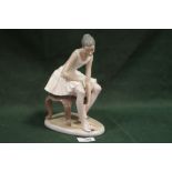 A LARGE SEATED NAO BALLERINA FIGURE