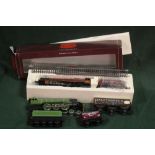 A BOX OF HORNBY MODEL RAILWAY LOCOMOTIVES AND CARRIAGES TO INCLUDE 4427 FLYING SCOTSMAN AND 6211