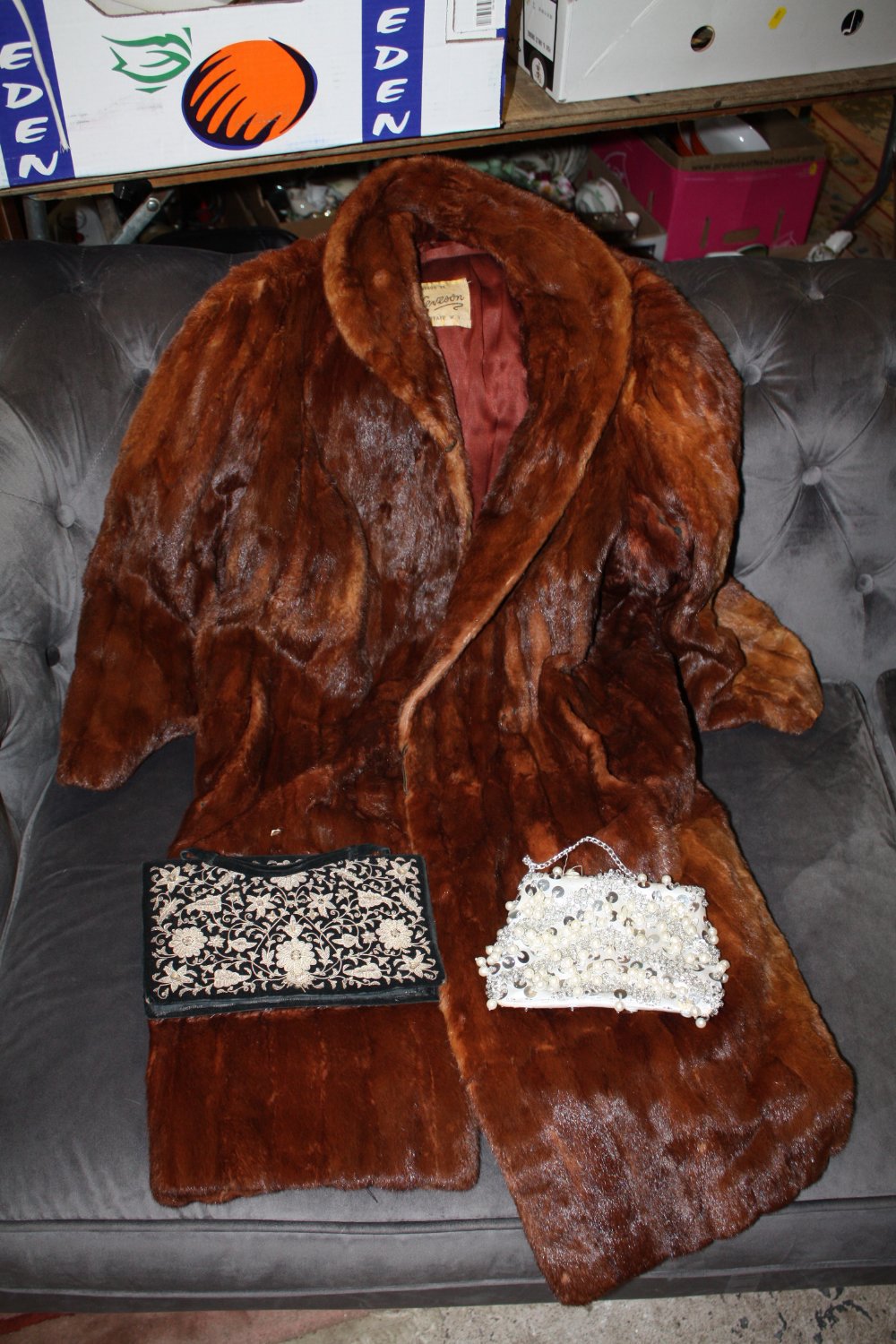 A LADIES VINTAGE FUR COAT TOGETHER WITH A VINTAGE PURSE PLUS ANOTHER
