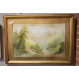 A GILT FRAMED AND GLAZED WATERCOLOUR OF A FIGURE DRIVING CATTLE TO THE STREAM, SIGNED R.E.HAGUE