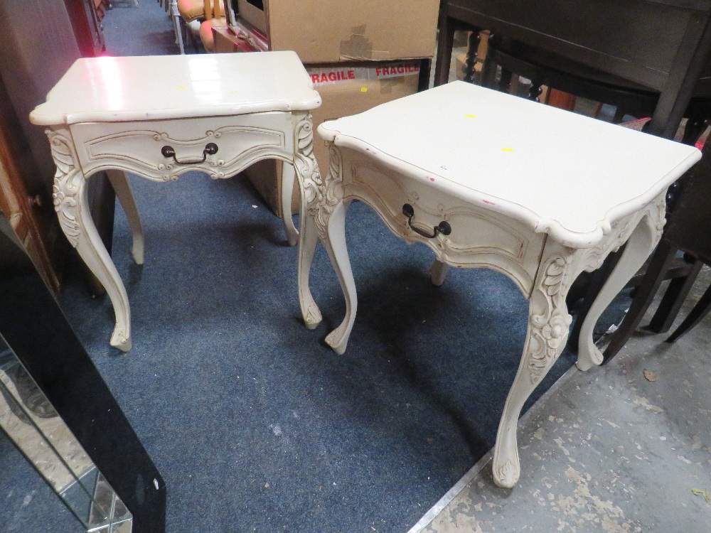 A NEAR PAIR OF PAINTED ROCOCO STYLE BEDSIDE CABINETS