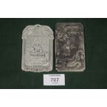 TWO ORIENTAL STYLE WHITE METAL PLAQUES/ TALISMANS