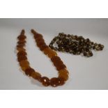 A VINTAGE LADIES AMBER STYLE NECKLACE, TOGETHER WITH ANOTHER (2)