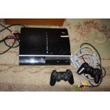 A PS3 CONSOLE AND CONTROLLERS