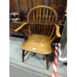 A SMALL TRADITIONAL ELM ARMCHAIR - REDUCED