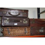 A COLLECTION OF VINTAGE BRIEFCASES TOGETHER WITH A WICKER BASKET