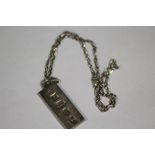 A HALLMARKED SILVER INGOT ON CHAIN