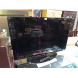 A LARGE SAMSUNG 46" FLATSCREEN TV WITH REMOTE, NO CABLE (H/C)