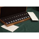 A BOXED SET OF TWELVE HALLMARKED SILVER RSPB SPOONS WITH CERTIFICATE