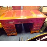 A REPRODUCTION LEATHER TOPPED TWIN PEDESTAL DESK H-75 W-122 CM