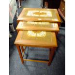 A RETRO TEAK NEST OF TILE TOP TABLES