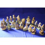 A COLLECTION OF 18 WADE CERAMIC FIGURES TO INCLUDE IRISH EXAMPLES