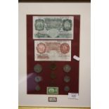 A FRAMED AND GLAZED 1950 COIN AND NOTE DISPLAY