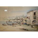 A FRAMED AND GLAZED WATERCOLOUR DEPICTING A CONTINENTAL HARBOUR SCENE INDISTINCTLY SIGNED LOWER LEFT