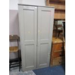 A PAINTED SCHOOL TYPE TWO DOOR CUPBOARD H-191 W-92 CM