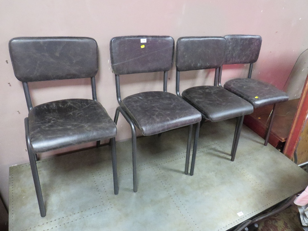 A SET OF SEVEN MODERN BLACK LEATHER STYLE DINING CHAIRS