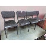 A SET OF SEVEN MODERN BLACK LEATHER STYLE DINING CHAIRS