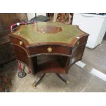 A REPRODUCTION MAHOGANY 'STAR' SHAPED LEATHER TOP DRUM STYLE TABLE H-81 CM DIA. 93 CM