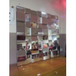 A LARGE MODERN ANGLED MIRROR 100 X 100 CM