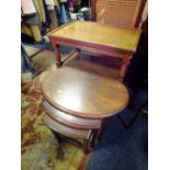 A REPRODUCTION OAK SERVING TROLLEY AND NEST OF TABLES