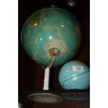 A DESK TOP GLOBE, TOGETHER WITH A GLOBE SHAPED MONEY BOX (2)