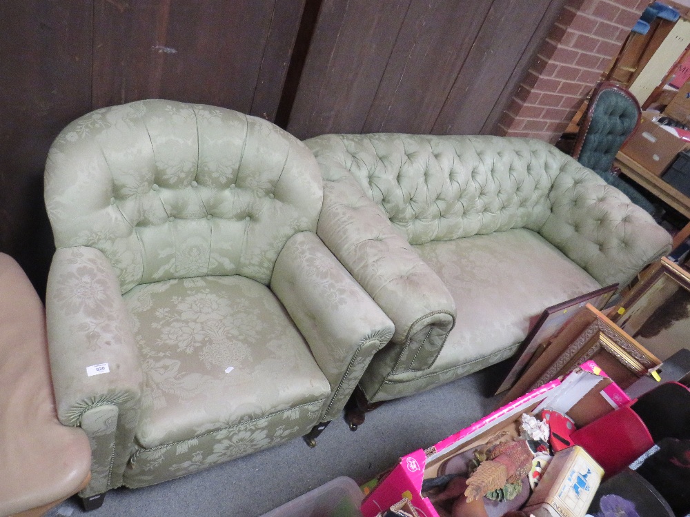 A VINTAGE CHESTERFIELD SOFA AND A MATCHED UPHOLSTERED ARMCHAIR