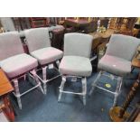 A SET OF FOUR MODERN UPHOLSTERED SWIVEL BAR STOOLS