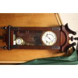 A REPRODUCTION MAHOGANY TEMPUS WALL CLOCK