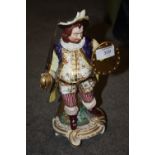 A SEVRES STYLE PORCELAIN FIGURE OF A GENTLEMAN WITH A SWORD AND SHEILD
