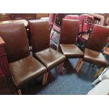 A SET OF 4 MODERN BROWN DINING CHAIRS