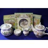 A BOXED ROYAL DOULTON BRAMBLY HEDGE MINIATURE THREE PIECE TEA SERVICE TOGETHER WITH A SUGAR BOWL AND