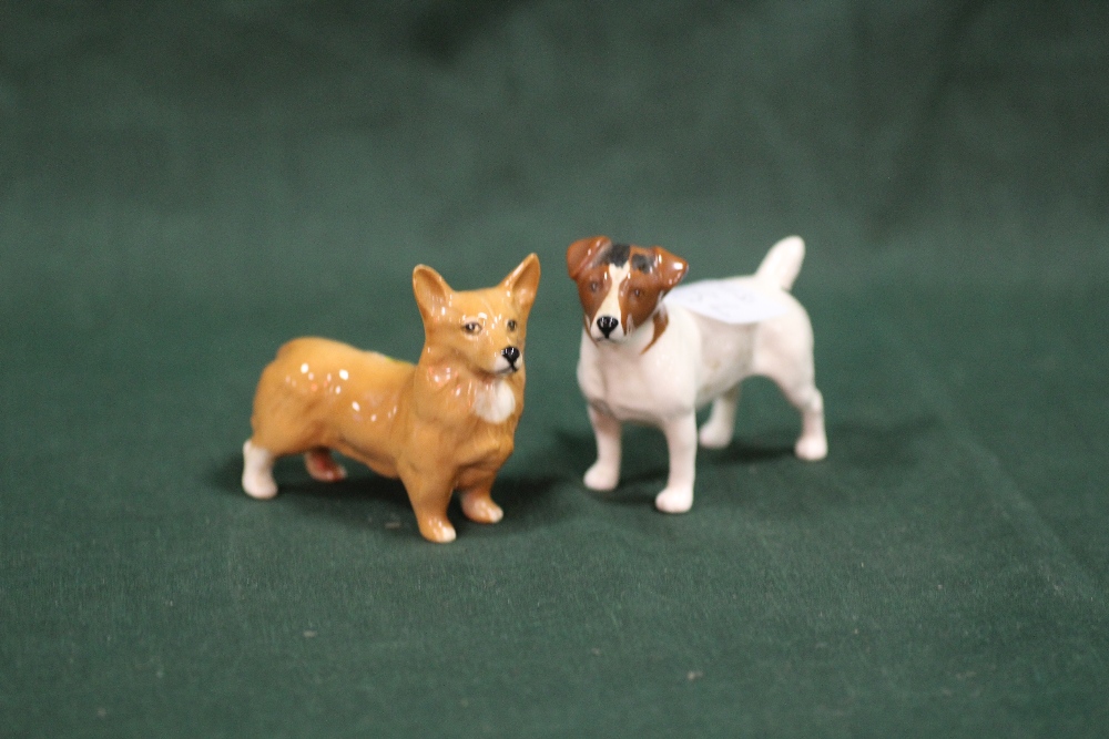 A BESWICK JACK RUSSELL FIGURE, TOGETHER WITH A BESWICK CORGI FIGURE (2)