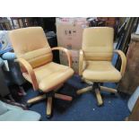 A PAIR OF MODERN OFFICE SWIVEL ARMCHAIRS