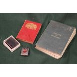 A HALLMARKED SILVER CASED MINIATURE DICTIONARY, TOGETHER WITH A MINIATURE BIBLE AND TWO OTHER