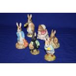 SIX ROYAL ALBERT BEATRIX POTTER FIGURES TO INCLUDE 'THE BLACK RABBIT', 'SAT ON A BANK'