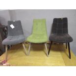 A SET OF THREE HARLEQUIN UPHOLSTERED DINING CHAIRS