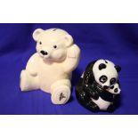 A WADE MONEY BANK IN THE FORM OF A PANDA WITH CUB TOGETHER WITH A TEDDY BEAR SHAPED EXAMPLE