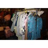 A RAIL OF VINTAGE LADIES CLOTHING, various styles and periods to inc examples by Gray & Osborne,