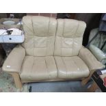 A MODERN STRESSLESS 2 SEATER RECLINING SOFA - SLIGHTLY WORN