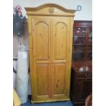 A MODERN HONEY PINE DOUBLE WARDROBE H- 214 CM W-99 CM