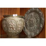 AN ANTIQUE EASTERN STYLE BRASS AND COPPER JARDINAIRE / VASE EMBOSSED WITH FIGURAL DEITIES,