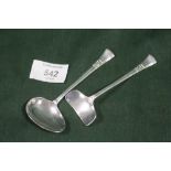 A HALLMARKED SILVER SPOON AND PUSHER SET