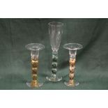 A PAIR OF MODERN STUDIO / ART GLASS CANDLESTICKS, engraved AM 2003, Alisder Malcolm Glass who is bas