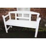 A PAINTED WHITE BENCH