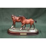 A ROYAL DOULTON MATTE FINISH SPIRIT OF LOVE FIGURE GROUP OF FOALS