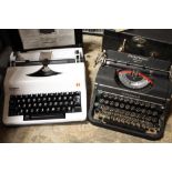 TWO CASED VINTAGE TYPEWRITERS