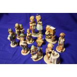 A COLLECTION OF GOEBEL AND HUMMEL FIGURES OF ASSORTED SIZES (10)