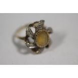 A HALLMARKED 9 CARAT GOLD DRESS RING SET WITH A CITRINE SIZE N APPROX WEIGHT - 4.8G