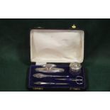 A CASED HALLMARKED SILVER MANICURE SET