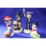 A COLLECTION OF FOUR WADE BETTY BOOP FIGURES